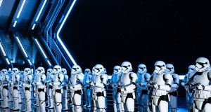 Unlock the Secrets of the Best Sci-Fi Movies white robot toy on black background