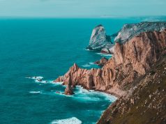body of water across mountain